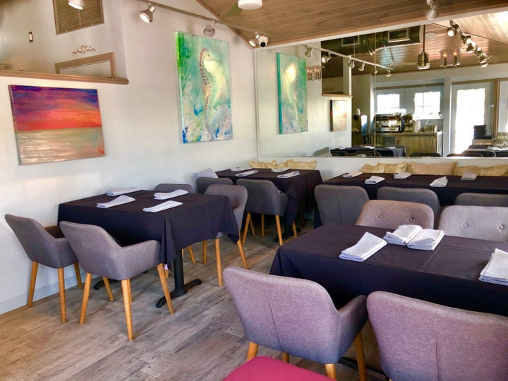 Sunshine Seafood Café and Wine Bar featuring art by Lacy McClary.
